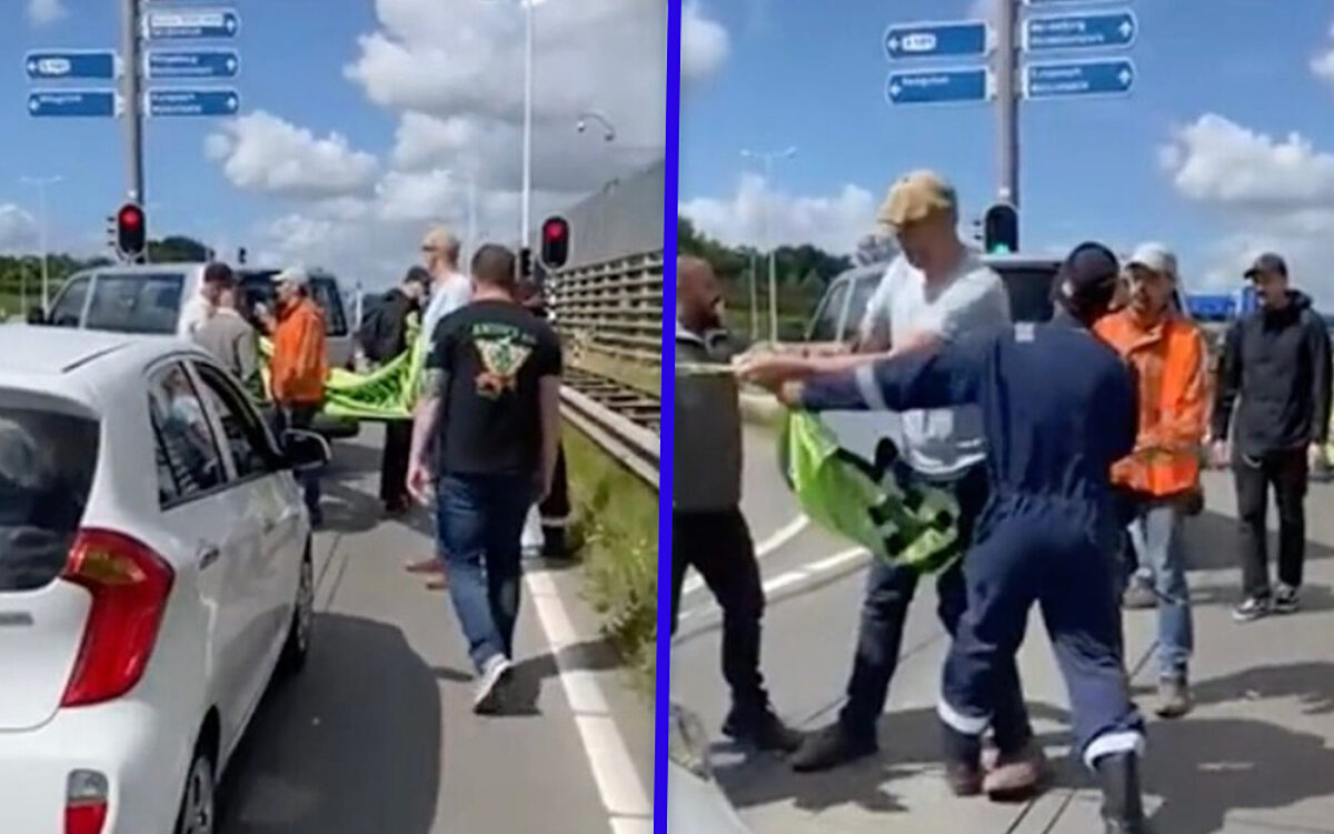 Boze automobilisten trekken Extinction Rebellion-activisten van de weg in Rotterdam